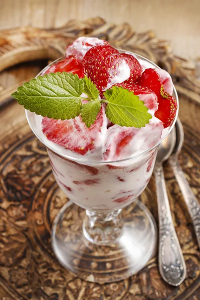 Strawberry smoothie decorated with mint leaf — Stock Photo, Image