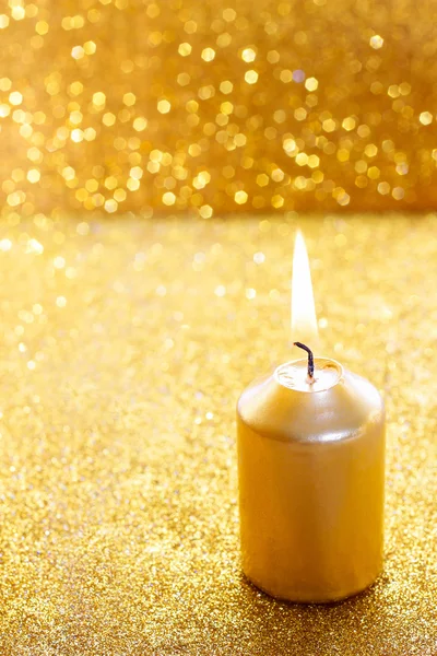 Golden candles. Gold glittering christmas lights. — Stock Photo, Image