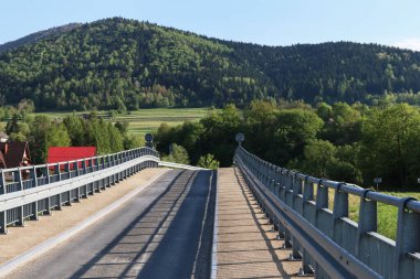 Bridge over the river in LUBIEN, Poland.