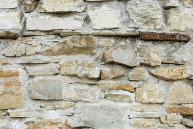 Taştan yapılmış eski bir duvar. Grafiksel kaynaklar