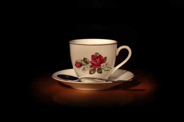 Vit coffe cup med en sked — Stockfoto