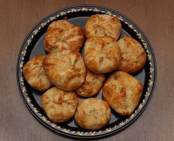 Fresh puffs on a tray on a table top view — Stock Photo, Image