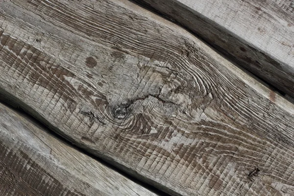 Tre gamla texturerat brädor liggande diagonalt bakgrund — Stockfoto