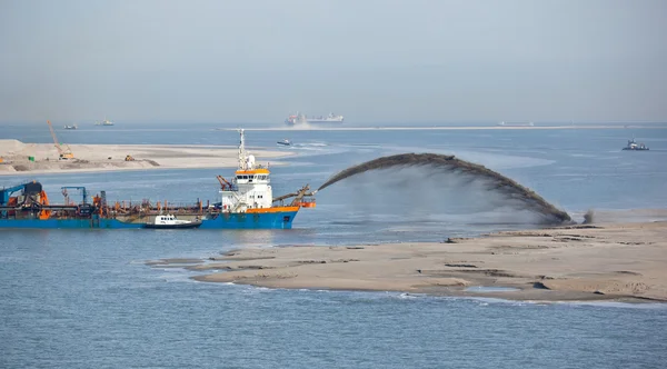 Dredging to create new land — Stock Photo, Image