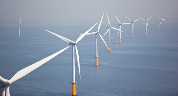 White wind turbine generating electricity — Stock Photo, Image