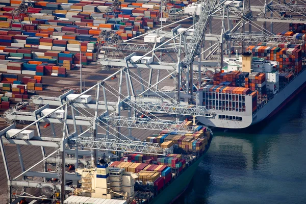 Cargo ships loading in cargo terminal — Stock Photo, Image