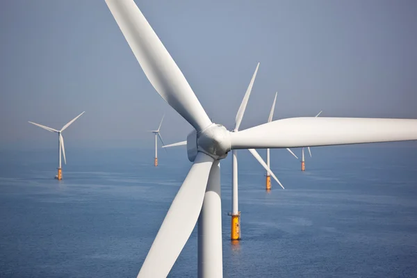 White wind turbine generating electricity — Stock Photo, Image