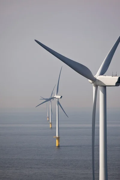 White wind turbine generating electricity — Stock Photo, Image