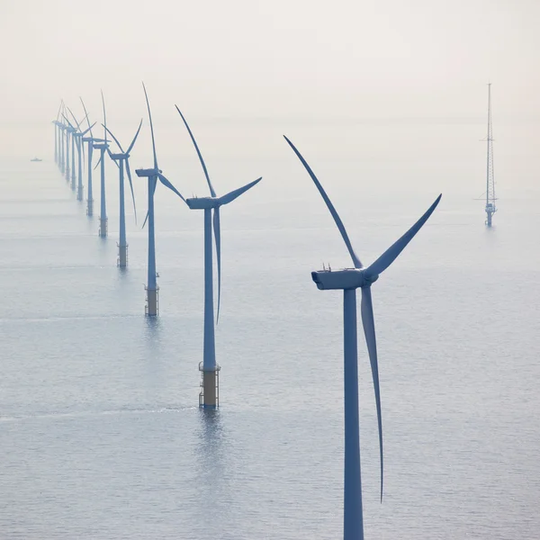 White wind turbine generating electricity — Stock Photo, Image