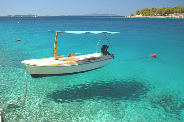 Boats in a quiet bay of Milna on Brac island, Croatia