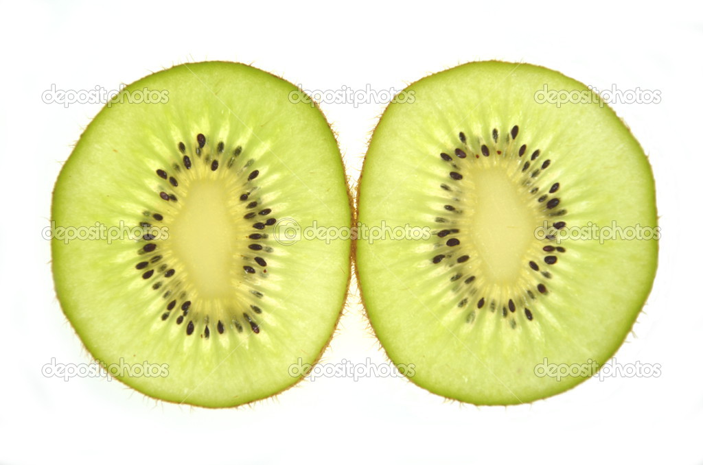 Slices of kiwi isolated on white background