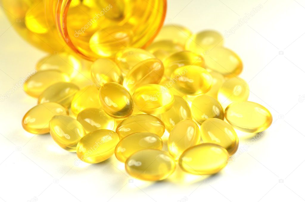 Fish oil capsules isolated on white background