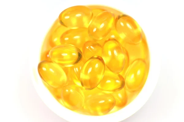 Visolie capsules in een fles — Stockfoto