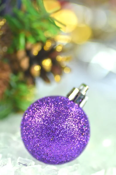 Christmas decoration, colored Christmas ball and bokeh background — Stock Photo, Image