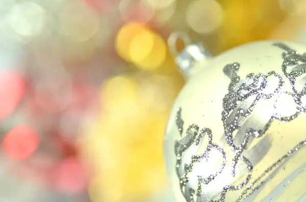 Christmas decoration, colored Christmas ball and bokeh background — Stock Photo, Image