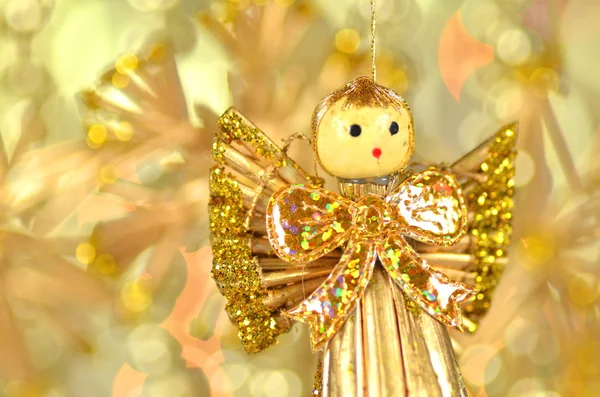 Christmas decoration, angel made of straw and bokeh background — Stock Photo, Image