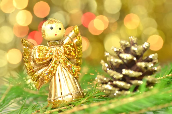 Christmas decoration, angel made of straw and bokeh background — Stock Photo, Image