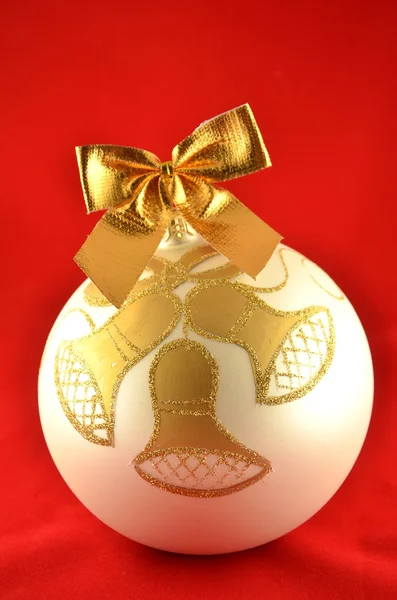 Christmas ball isolated on red background — Stock Photo, Image