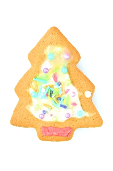 Delizioso biscotto natalizio decorato isolato su sfondo bianco — Foto Stock