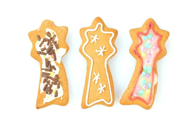 Beyaz arka plan üzerinde izole lezzetli süslü Noel kurabiyesi — Stok fotoğraf