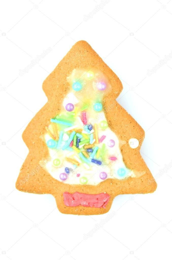 Delicious decorated Christmas cookie isolated on white background