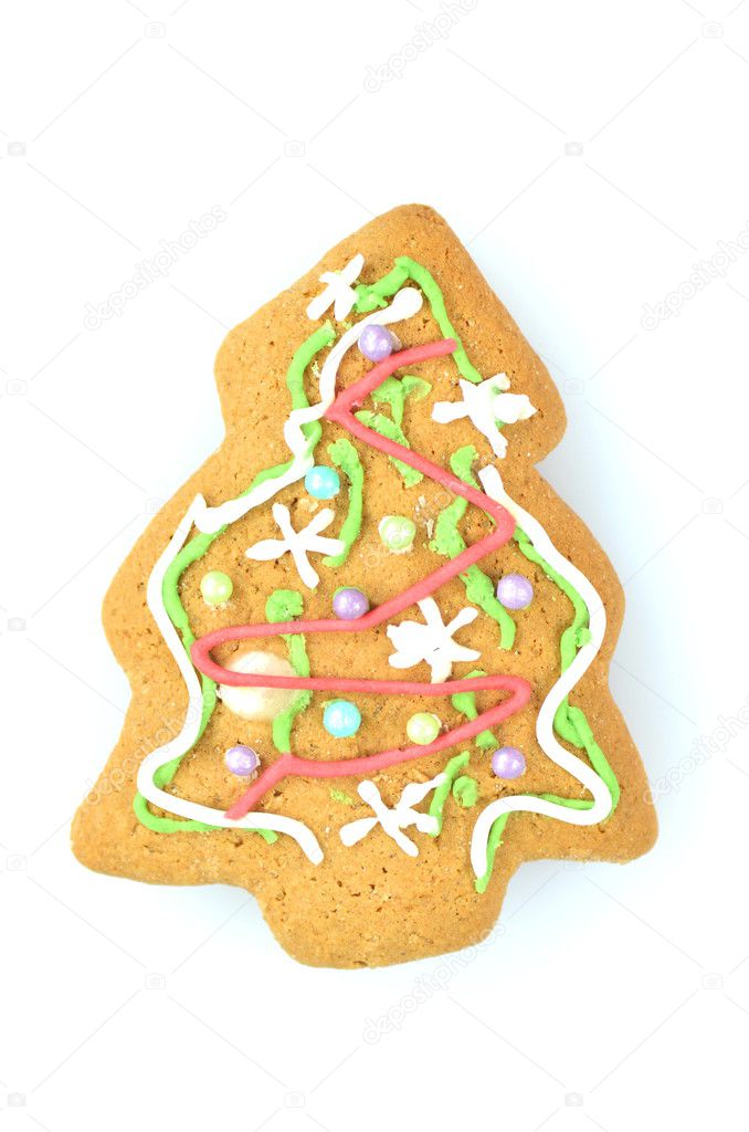 Delicious decorated Christmas cookie isolated on white background