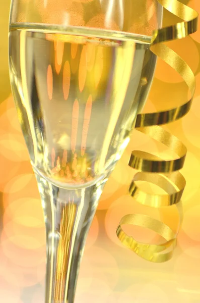 Une coupe de champagne sur fond bokeh — Photo