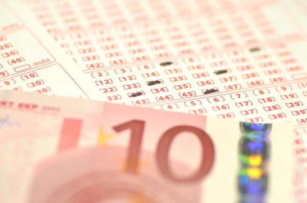 Closeup of lottery ticket and euro banknotes — Stock Photo, Image