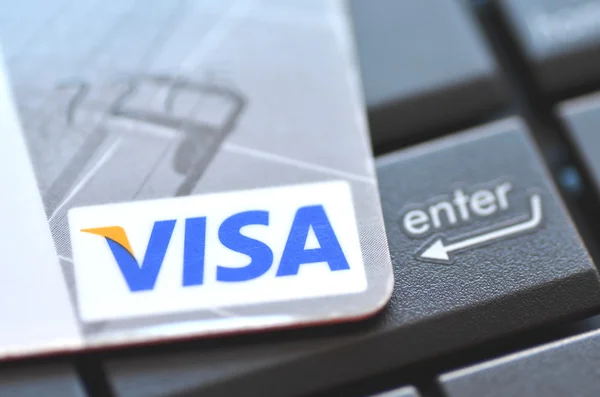 Closeup of VISA credit card on laptop keyboard — Stock Photo, Image