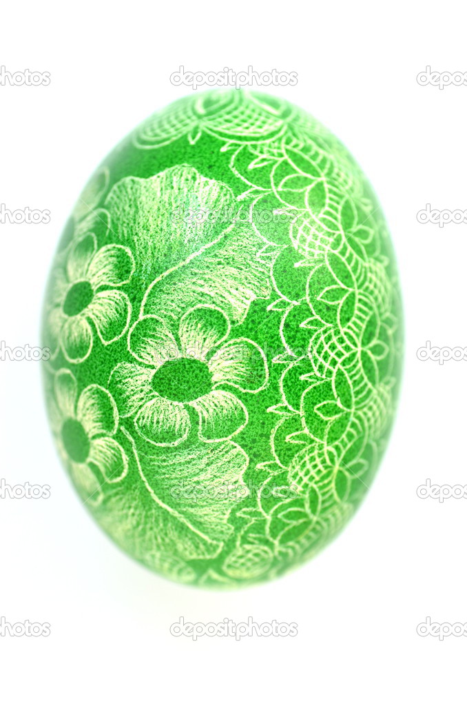 Traditional scratched handmade Easter egg isolated on white background