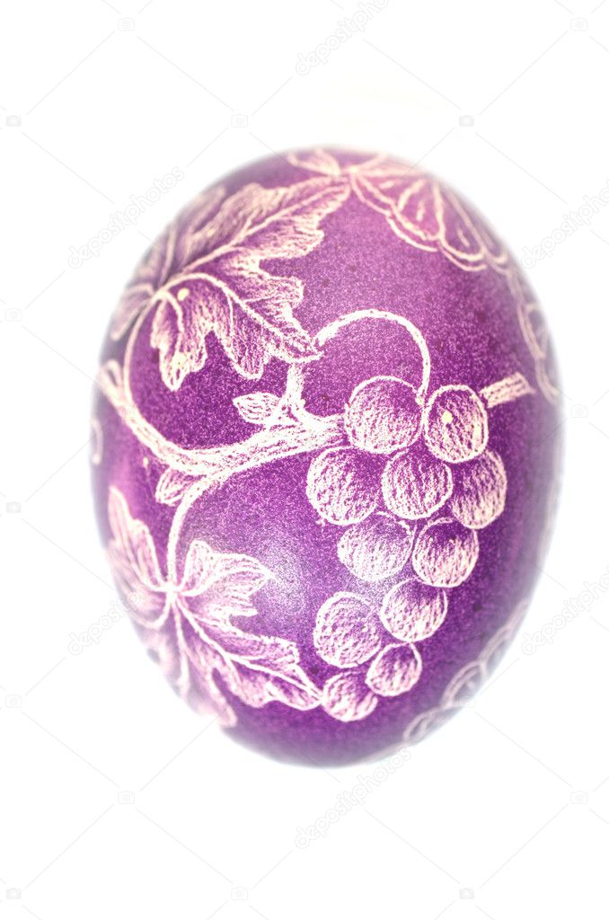 Traditional scratched handmade Easter egg isolated on white background