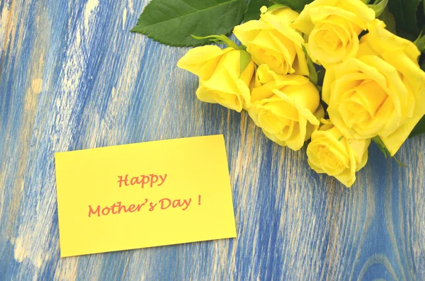 Happy mothers day and bouquet of gorgeous yellow roses — Stock Photo, Image