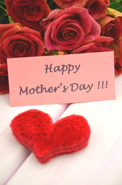 Happy mothers day and bouquet of gorgeous red roses — Stock Photo, Image