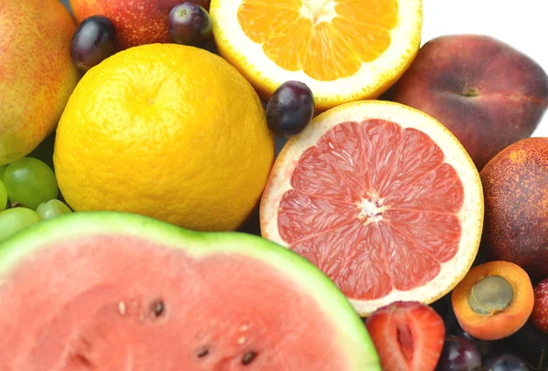 Variety of fresh and delicious fruits isolated on white — Stock Photo, Image