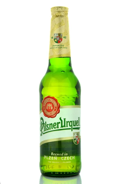 Pilsner Urquell pale lager beer isolated on white — Stock Photo, Image
