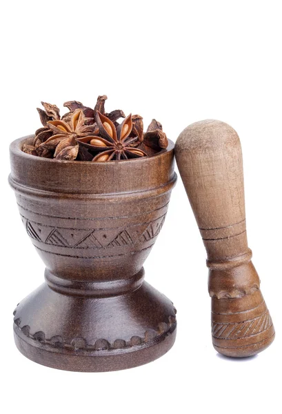 Anise stars in wooden mortar — Stock Photo, Image