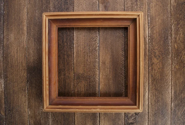 老式的相框、 木制背景 — 图库照片
