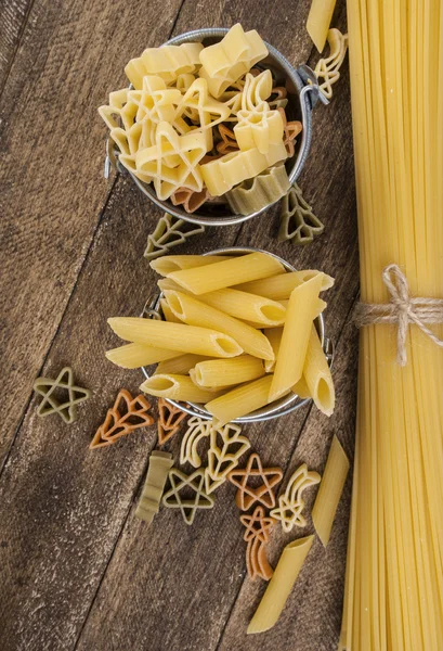 Close up on assortment of uncooked pasta — Stock Photo, Image
