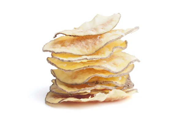 Pilha de batatas fritas em um fundo branco — Fotografia de Stock