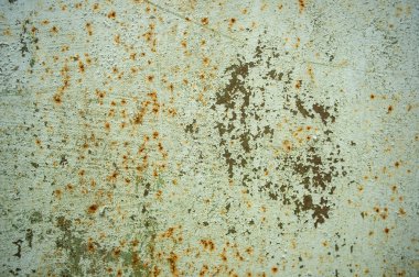 Pas desenli mavi boyanmış metal.