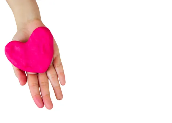 Heart of play dough on hand isolate — Stock Photo, Image