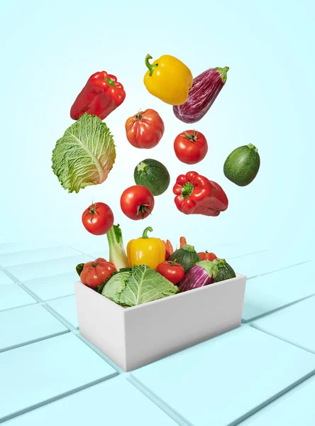 Vegetables Falling Box Blue Background — Stockfoto