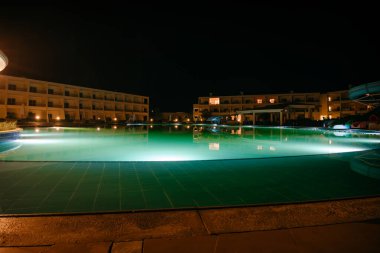 EGYPT. LUXOR - 10.10.2021. Night View Of Villa Resort With Swimming Pool. A beautiful pool illuminated at night