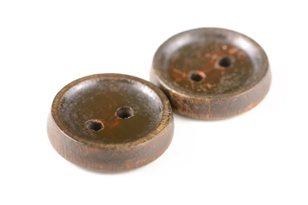 Velhos botões castanhos isolados no fundo branco — Fotografia de Stock