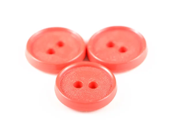 Vecchi pulsanti rossi isolati su sfondo bianco — Foto Stock