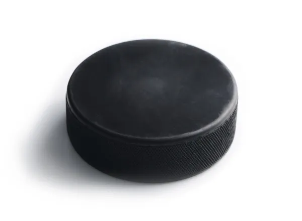 Hockey puck isolerad på vit bakgrund — Stockfoto