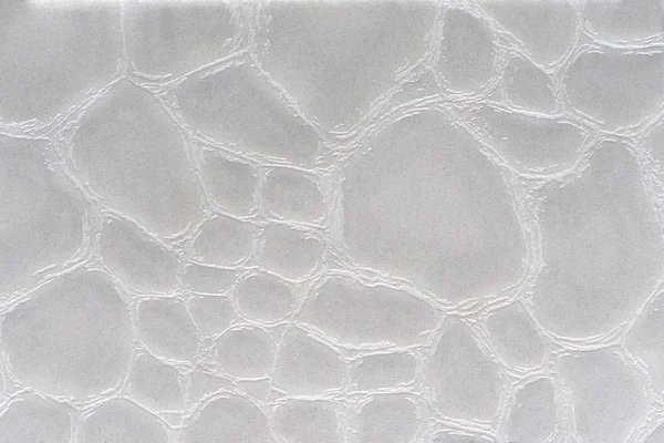 Srebrny skóry syntetycznej z wytłoczonym — Zdjęcie stockowe