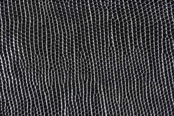 Black synthetic leather with embossed texture — Stock Photo, Image