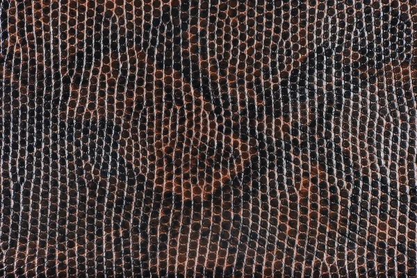 Темно-коричневая синтетическая кожа с тиснением — стоковое фото