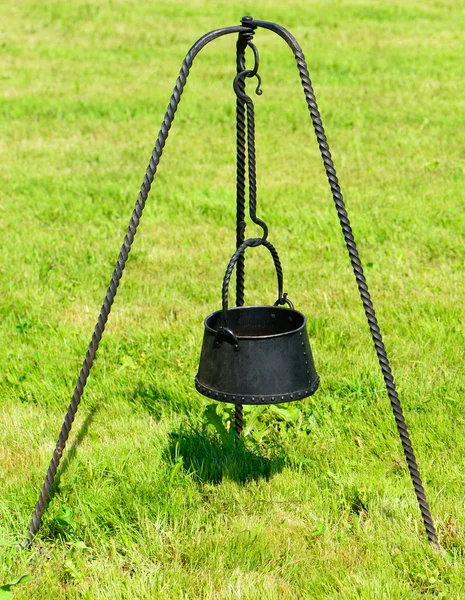 Old billy on a tripod — Stock Photo, Image